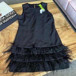 Black minidress with feather hem
